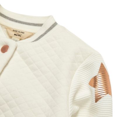 Mini girls cream quilted star bomber jacket